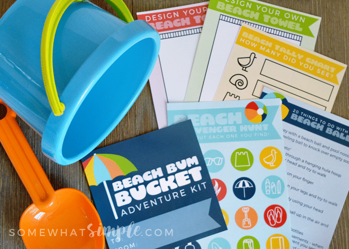 Beach activities and printables for kids laying next to a bucket