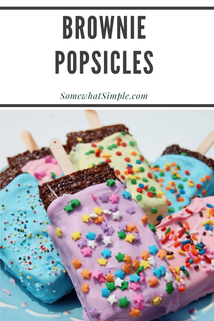 Popsicle brownies are a fun a delicious way to dress up a classic dessert that'll make them even more fun to eat!  Made using your favorite brownie recipe and few other simple ingredients, they'll be ready in no time! #browniepopsicles #kidsdessert #chocolatebrowniepopsicles #kidsdessertidea #funbrownierecipe via @somewhatsimple