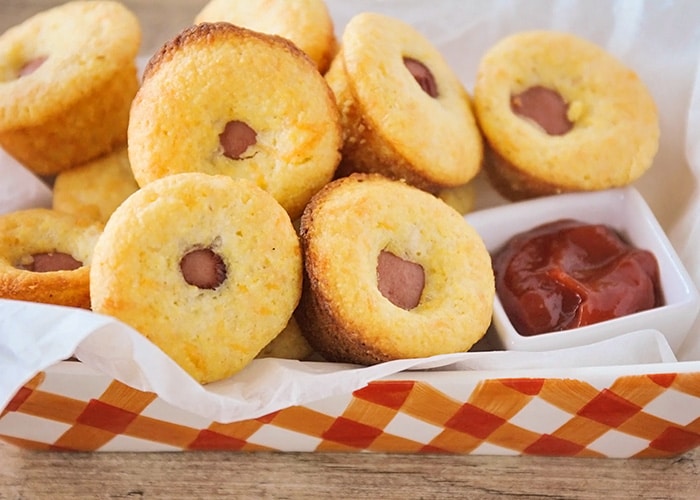 a basket of Corn Dog Muffins