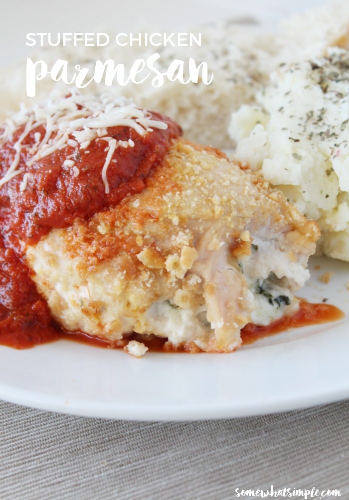 This Stuffed Chicken Parmesan recipe is a delicious twist on one of my favorite dinner recipes.   Take a tender piece of chicken, fill it with mouthwatering cheese, and top it with a Parmesan crust!  This easy recipe will quickly become one of your favorite chicken recipes.  #stuffedparmesanchicken #parmesanchickenrecipe #easydinner #chickenrecipe  via @somewhatsimple