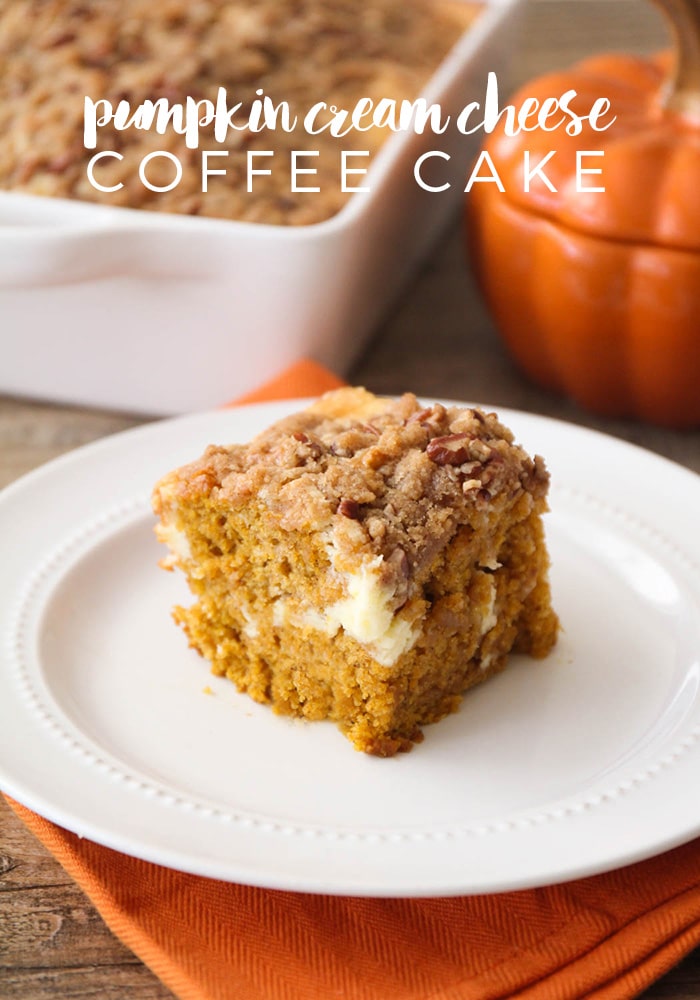 This pumpkin cream cheese coffee cake is so deliciously indulgent! Tender pumpkin cake with a sweet cheesecake layer, topped with a cinnamon pecan streusel. Made with cream cheese and pumpkin puree this coffee cake is going to knock your socks off! #pumpkincoffeecake #pumpkincreamcheesecoffeecake #falldesserts #easypumpkindessert #easypumpkincoffeecake via @somewhatsimple