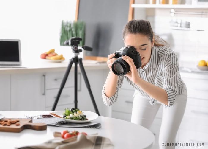 Food blogger shooting a plate of food