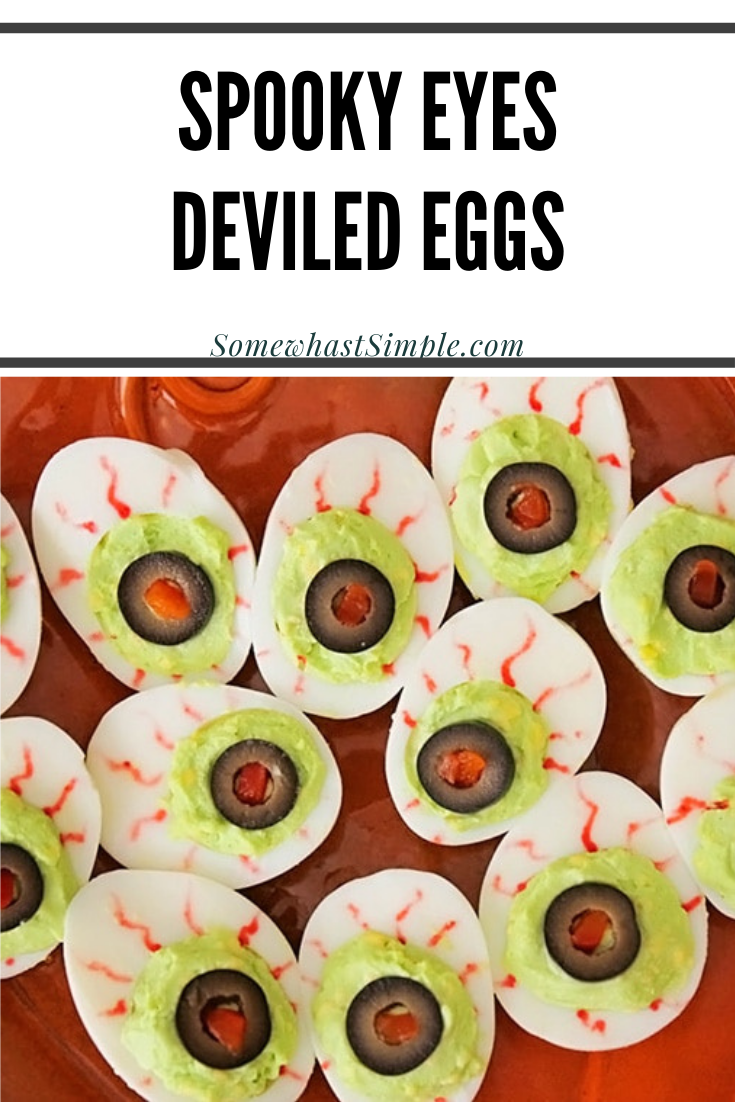 Goblin Eyes are a festive food for a Halloween party that taste great too! These delicious appetizers are super easy to make and make the perfect starter. Just take a regular deviled egg and make a few minor modifications and you're all set! via @somewhatsimple