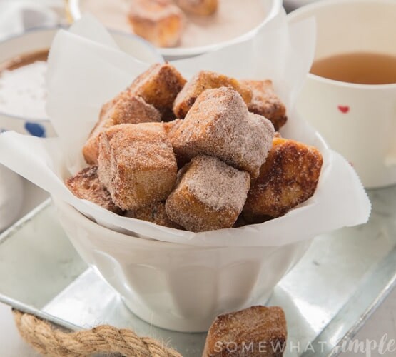 Crisp and sweet French Toast Bites rolled in Apple spice sugar and dunked in apple pie sauce! The perfect Fall treat!