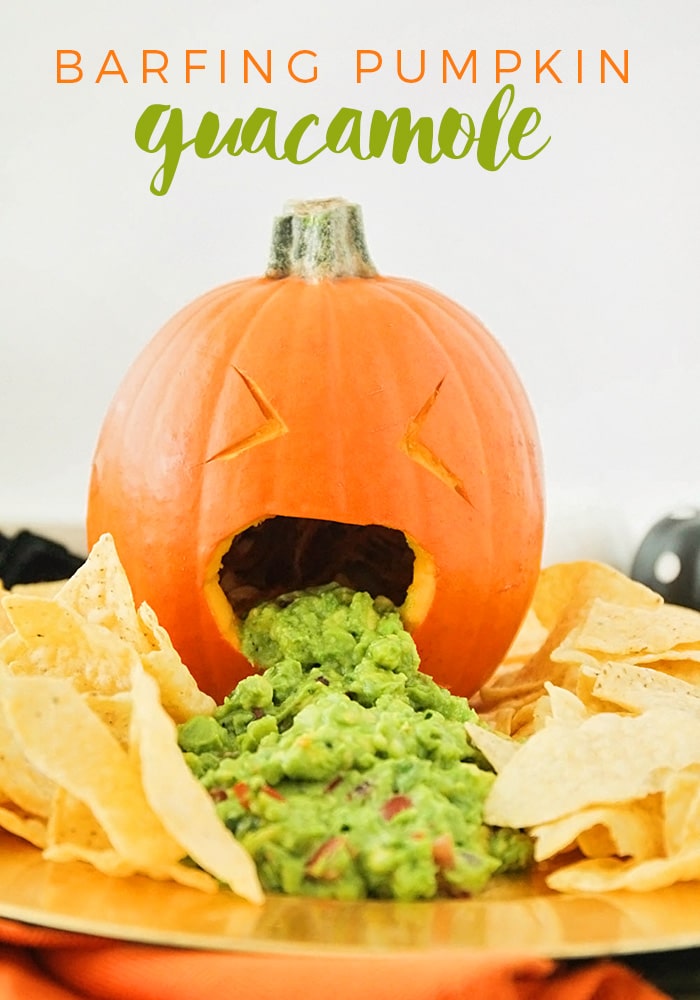 Get some good laughs at your next Halloween party with this throwing up pumpkin guacamole!  It's the perfect addition for any party.  What screams Halloween more than having a pumpkin throwing up everyone's favorite dip! It's easy to make and everyone will love it! #barfingpumpkinguacamole #throwinguppumpkingguacamole #throwinguppumpkincarving #barfingpumpkindip #throwinguppumpkinghalloweenparty via @somewhatsimple