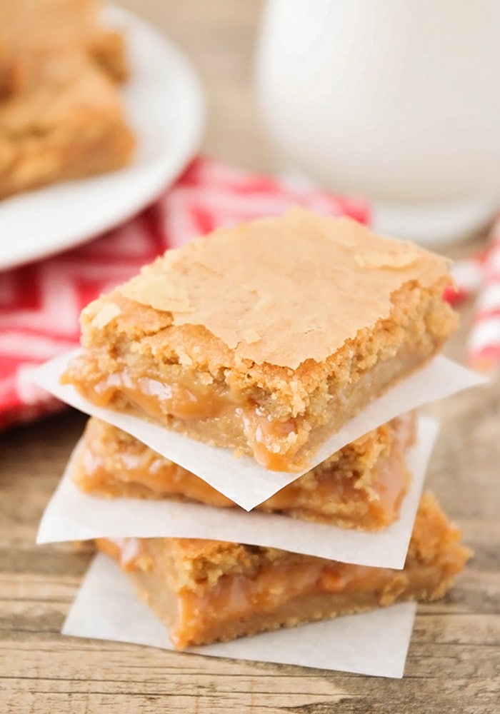 Caramel Cheesecake Cookie Bar squares stacked