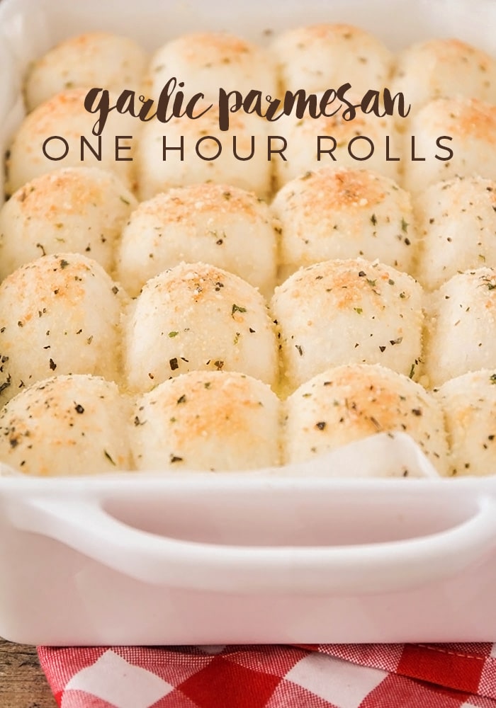 These garlic parmesan dinner rolls are so light and fluffy, and easy to make!  Ready in an hour, you can serve these anytime you want! #pullapartgarlicparmesanrolls #garlicparmesandinnerrolls #easygarlicparmesanrolls #garlicparmesanrollsrecipe #rhodesrollsrecipegarlicparmesan via @somewhatsimple