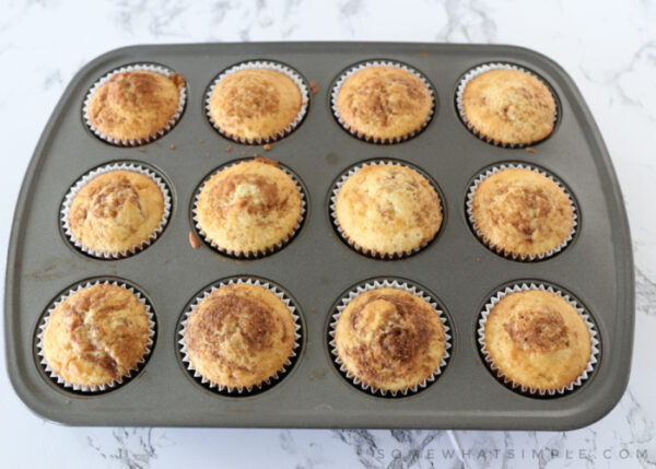 golden brown cupcakes in a cupcake pan