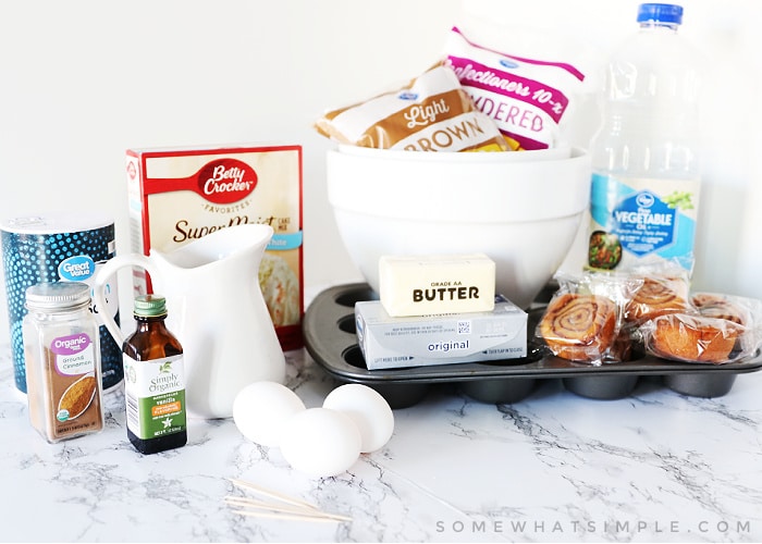 ingredients to make cinnamon roll cupcakes sitting on the counter