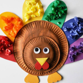 Cute Turkey Craft for Kids where they match squares of colored paper to the coordinating color of feather on a turkey