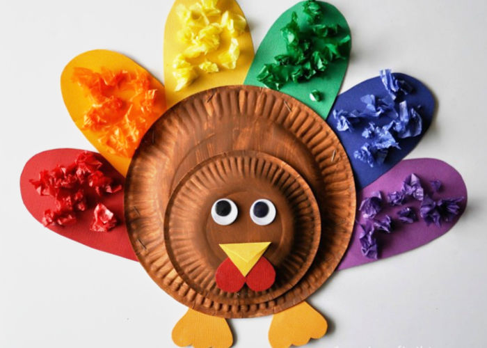Cute Turkey Craft for Kids where they match squares of colored paper to the coordinating color of feather on a turkey
