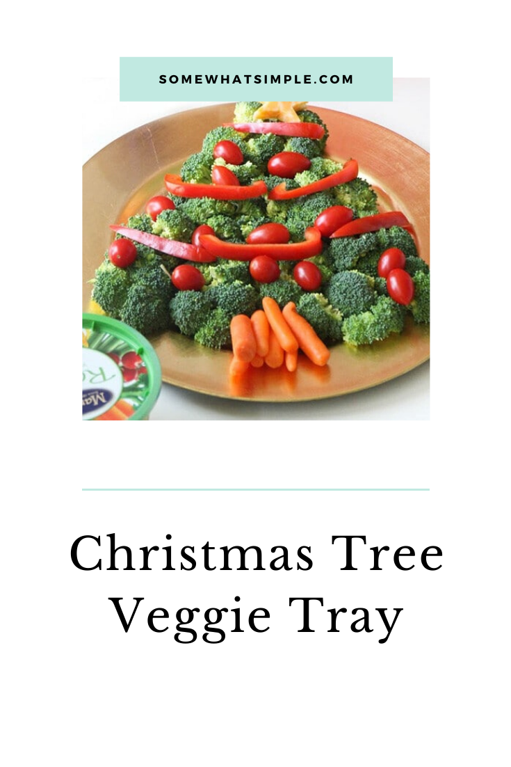 This Christmas tree veggie tray is simple and easy to make. The kids will love helping you arrange the veggies on the tray to make a fun Christmas tree shape that's perfect for the holidays. This veggie tray idea is simple and festive and makes the perfect holiday appetizer. via @somewhatsimple