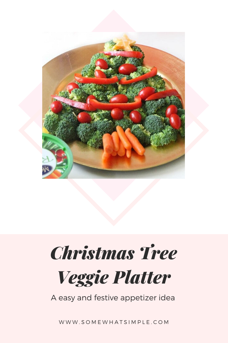 This Christmas tree veggie tray is simple and easy to make. The kids will love helping you arrange the veggies on the tray to make a fun Christmas tree shape that's perfect for the holidays. This veggie tray idea is simple and festive and makes the perfect holiday appetizer. via @somewhatsimple