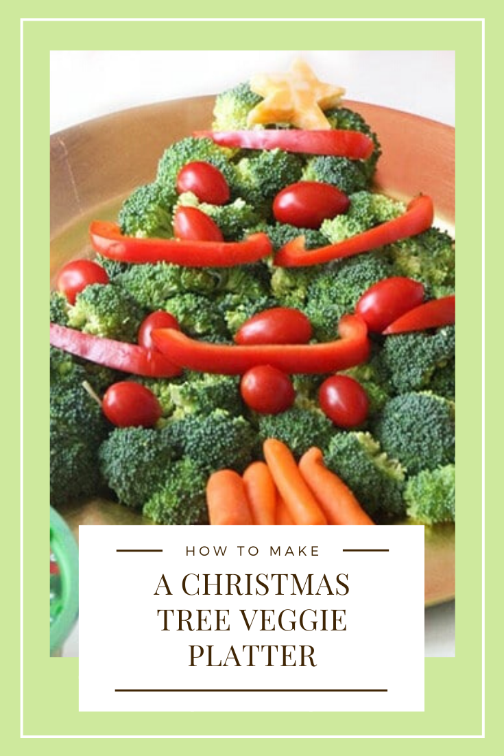 This Christmas tree veggie tray is simple and easy to make. The kids will love helping you arrange the veggies on the tray to make a fun Christmas tree shape that's perfect for the holidays. This veggie tray idea is simple and festive and makes the perfect holiday appetizer. via @somewhatsimple