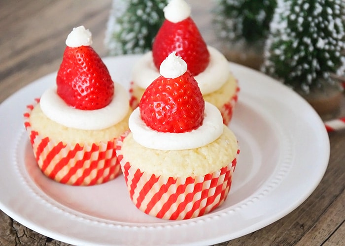 Santa Hat Cupcakes topped with fresh strawberries