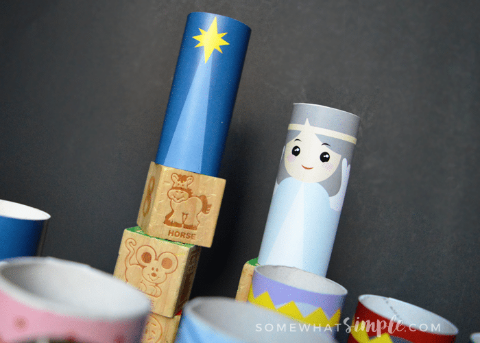 an angel and star Christmas craft nativity made out of toilet paper rolls