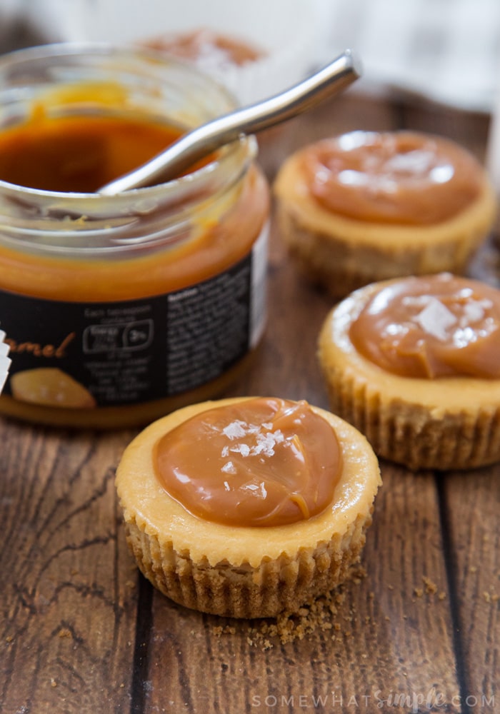 mini cheesecakes topped with caramel and salt