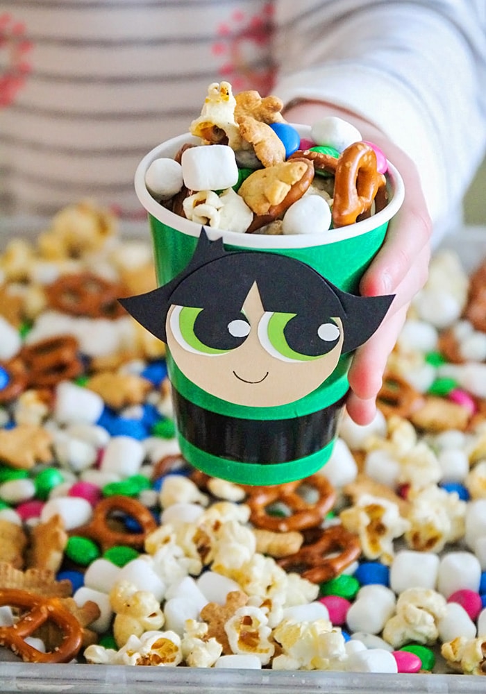 a powerpuff cup filled with snack mix