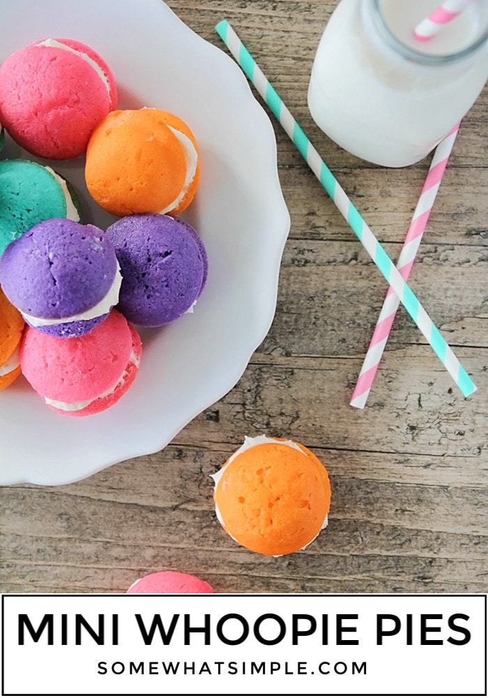 Add some fun to your food with these colorful mini Whoopie Pie Cupcake Poppers! A delicious frosting sandwiched between everyone's favorite part of a cupcake.. the cupcake tops! #cupcakes #cupcake #miniwhoopiepies #cupcakepoppers #howtomakeminiwhoopies via @somewhatsimple