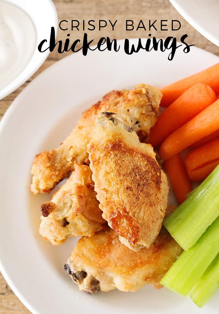 These delicious and crispy baked chicken wings are so easy and quick to make, and come out of the oven crisp and tender. They're a perfect appetizer for parties or a delicious snack!  #bakedchickenwings #crispychickenwings #ovenbakedchickenwings #bakedchickenwings #crispyovenbakedchickenwings via @somewhatsimple