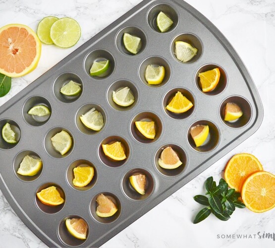 pieces of fruit in a mini muffin tin