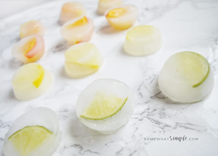 frozen ice cubes with cut up fruit inside them