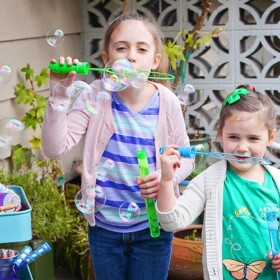 This simple and fun outdoor play station has everything you need to keep the kids entertained and hydrated all summer long!