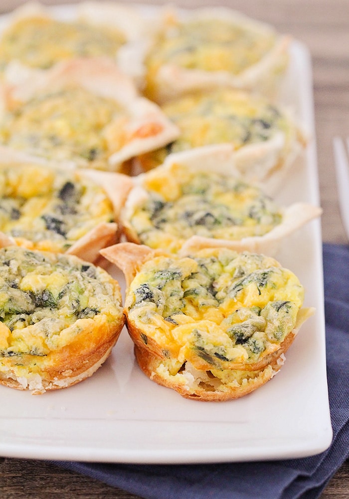 These cheddar spinach mini quiches are perfect for a quick breakfast or a light dinner! They're savory, cheesy, and so delicious!