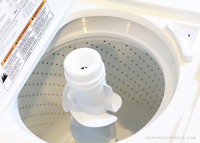 looking into a top load washing machine that is extremely clean after using these tips that teach how to clean your washing machine