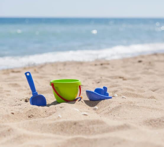beach toys stuck in the sand