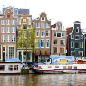 homes in amsterdam along the canal