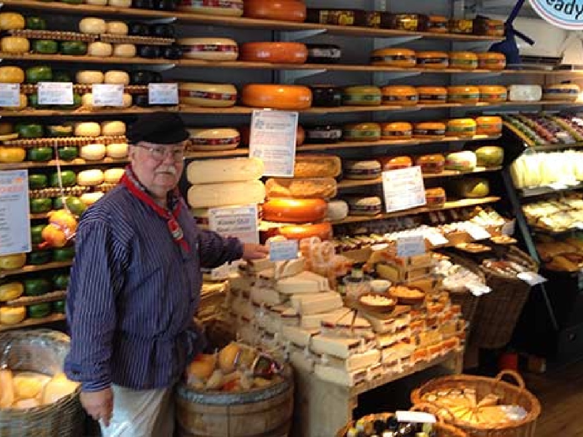 man standing in cheese museum