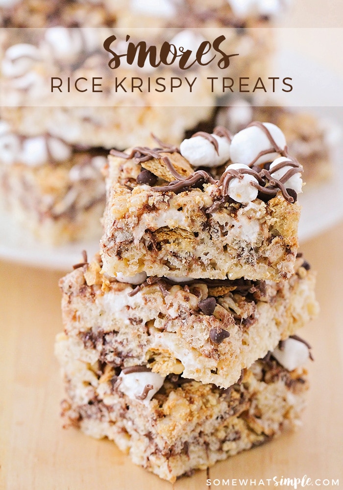 S'mores rice krispie treats are a delicious variation on a classic camping treat! They're fast & easy to make, and taste amazing! Made with the delicious combo of marshmallows, graham crackers and chocolate, there's no rice krispie treat quite like these. via @somewhatsimple