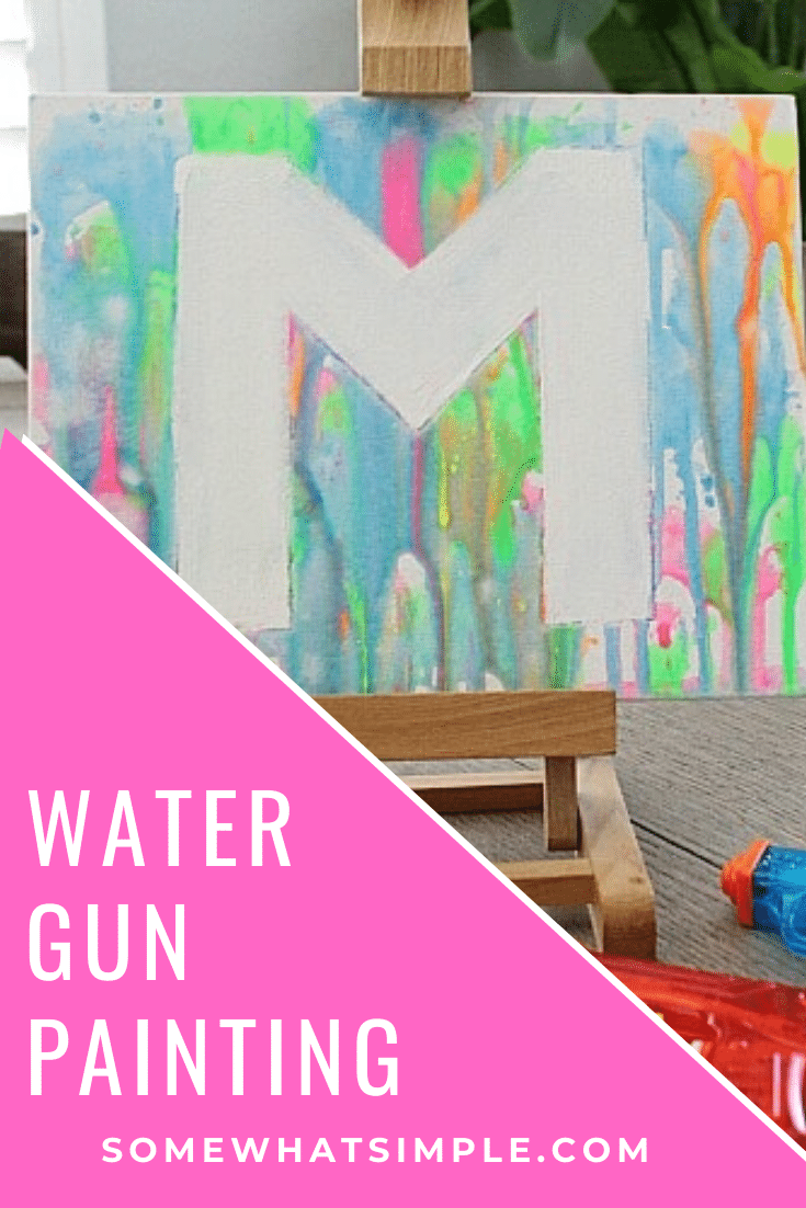 If you're looking for some fun, inexpensive art projects for kids this summer, add painting with water guns to your list! This will keep your kids busy and doing something creative with their time. #watergunpainting #funkidsactivity #paintingactivity #artproject #funprojectforkids via @somewhatsimple