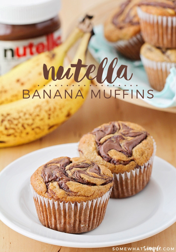 A classic banana muffin gets a swirl of chocolate Nutella to make a sweet little treat that tastes AMAZING! Nutella Banana Muffins are easy to make and totally delicious! via @somewhatsimple