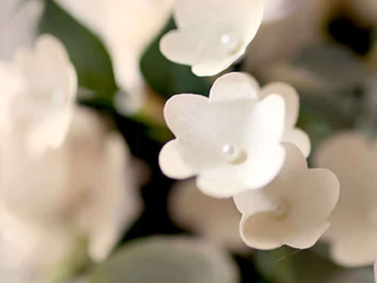 white paper flowers made from sticky notes