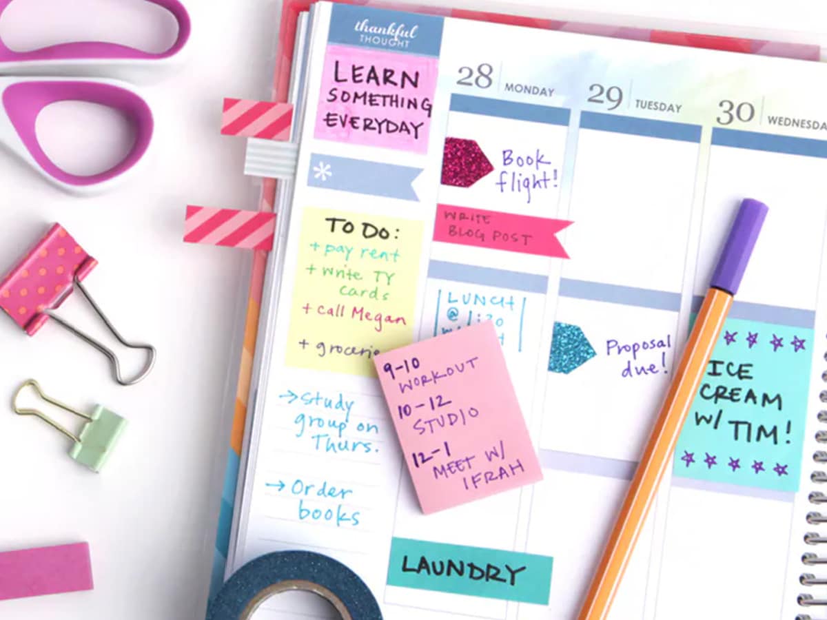 school planner with colorful post it notes 