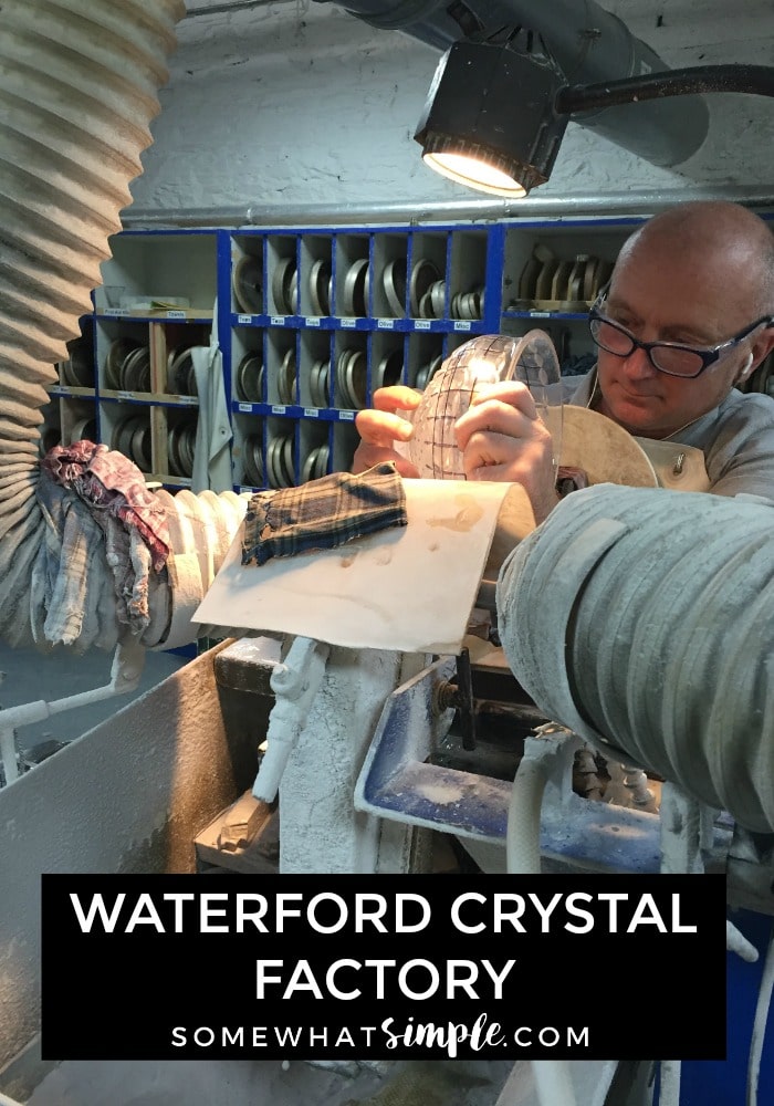 a man carving a crystal bowl at the Waterford Crystal Factory Ireland