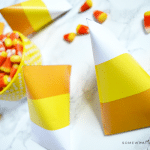 paper candy corn pouch holding candy corns inside