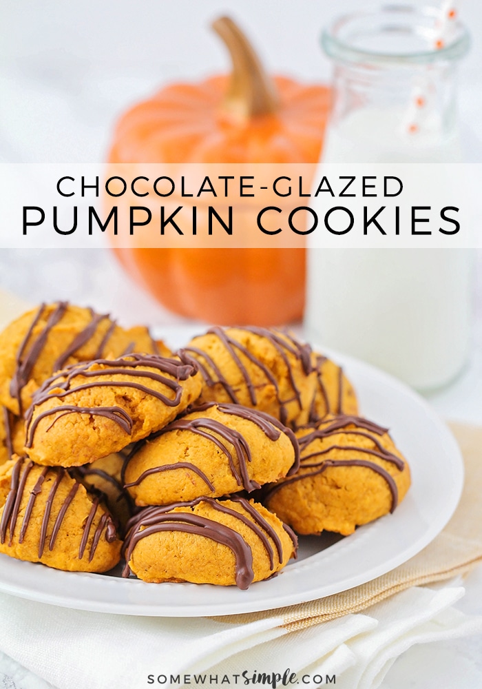 Grab a tall glass of milk and get ready for these amazing and super easy chocolate glazed pumpkin cookies! Made from scratch, these cookies turn out soft and fluffy every time. It's the perfect fall cookie recipe that you won't be able to stop eating. #chocolateglazedpumpkincookies #chocolateglazedpumpkincookierecipe #easypumpkincookies #pumpkincookiesfromscratch #pumpkinchocolatecookies via @somewhatsimple
