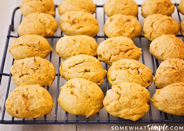 a cooling rack filled with fluffy pumpkin cookies