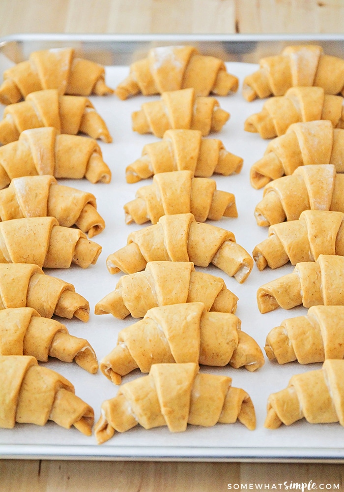 a baking sheet of pumpkin crescent dinner rolls