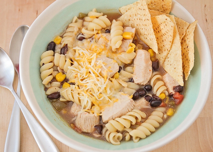 This simple and savory southwest chicken noodle soup is delicious and filling, and ready in less than thirty minutes. A quick and easy cold weather meal!