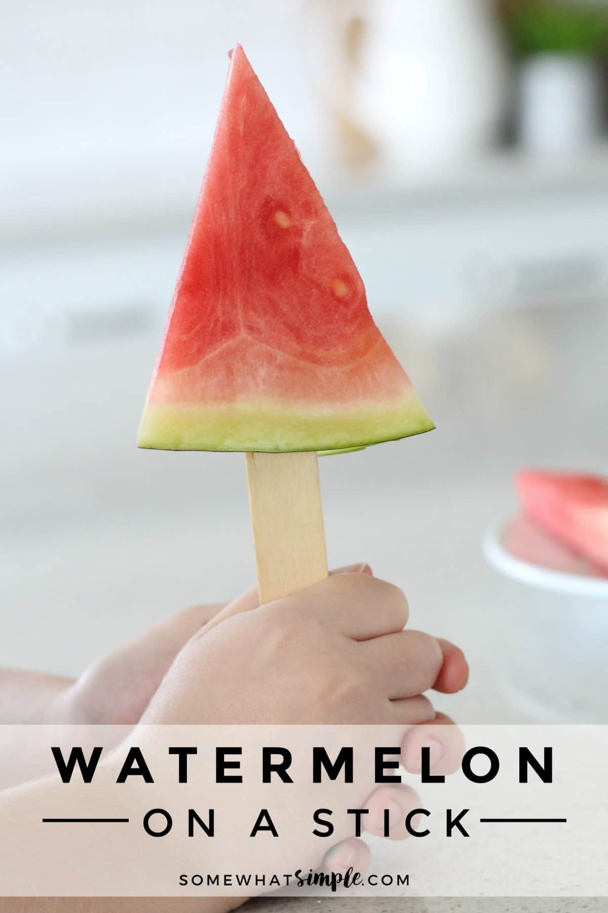 This fun Watermelon on a Stick idea is a great way to enjoy this healthy summer treat! It's perfect to serve at your next bbq or any summer afternoon. #watermelononastick #summersnack #healthysnack #healthyeating #kidsactivities via @somewhatsimple