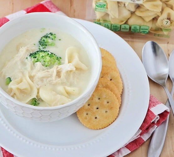 Tortellini Soup in a white bowl