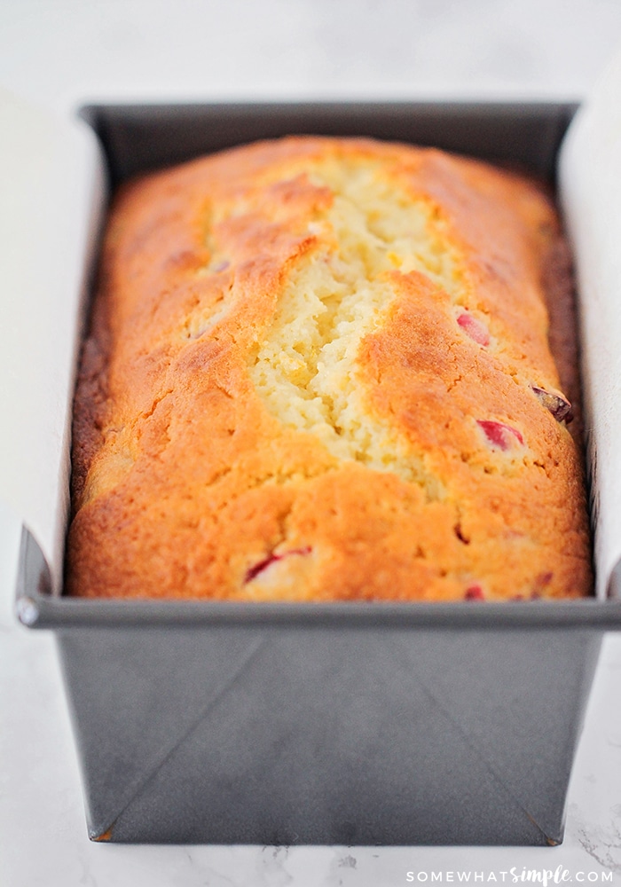This delicious cranberry orange sweet bread is so easy to make and perfect for parties or gifting! It's so tender and sweet and loaded with cranberries!