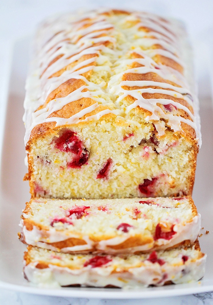 This delicious cranberry orange sweet bread is so easy to make and perfect for parties or gifting! It's so tender and sweet and loaded with cranberries!