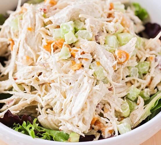 crunchy chicken salad in a white serving bowl