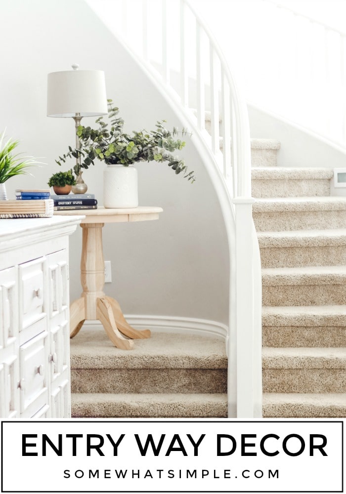 Our Entry Way - We've been in our house for 6 months now and every day I love it more! Here's a tour of the entry way of our new home! #entryway #entrywaytable #entrywayhomedecoridea #entrywaydecor #entrywayidea via @somewhatsimple