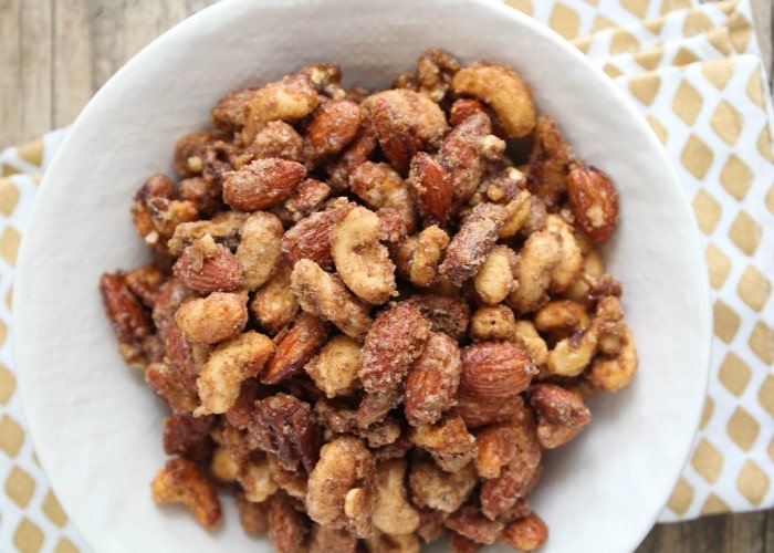 a bowl of Candied Mix Nuts is a fun super bowl snack to serve